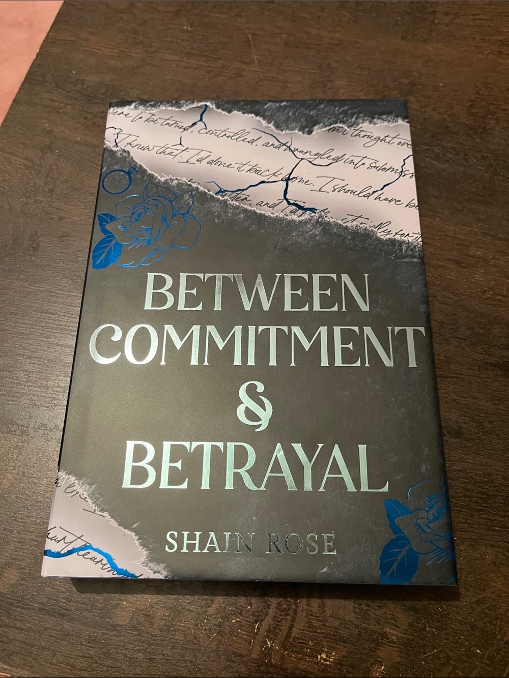 Between Commitment & Betrayal — By Shain Rose Collectors Edition Signed Sprayed